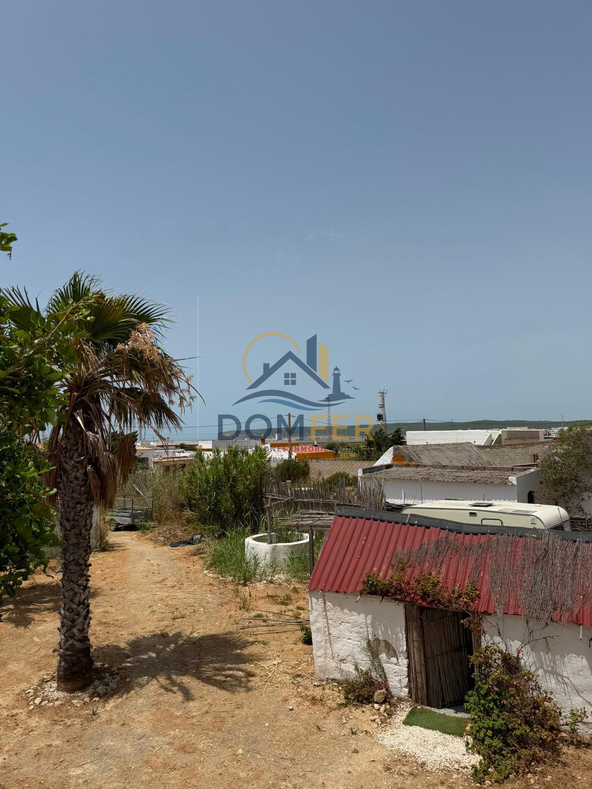 Una joya natural en la Costa de la Luz: Parcela única con vistas al mar y las marismas