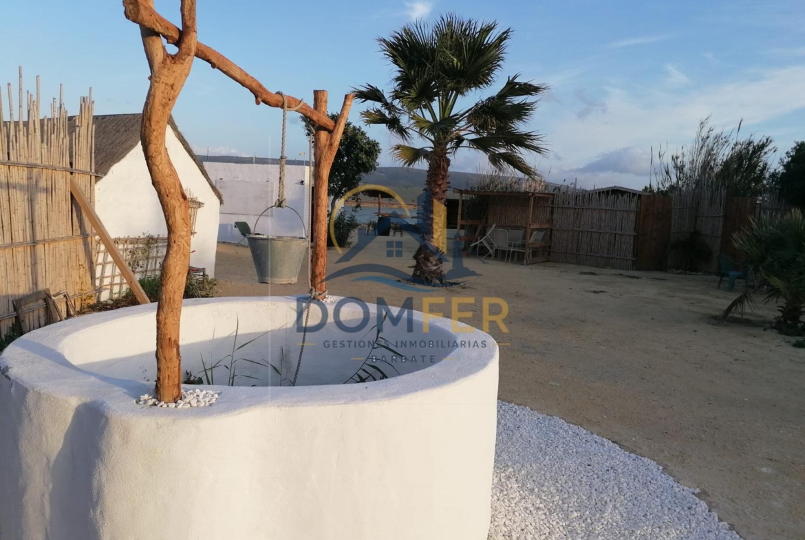 Una joya natural en la Costa de la Luz: Parcela única con vistas al mar y las marismas