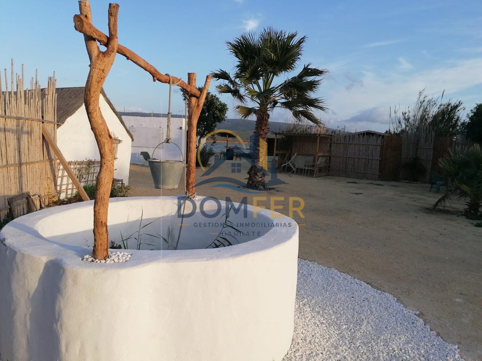 Una joya natural en la Costa de la Luz: Parcela única con vistas al mar y las marismas