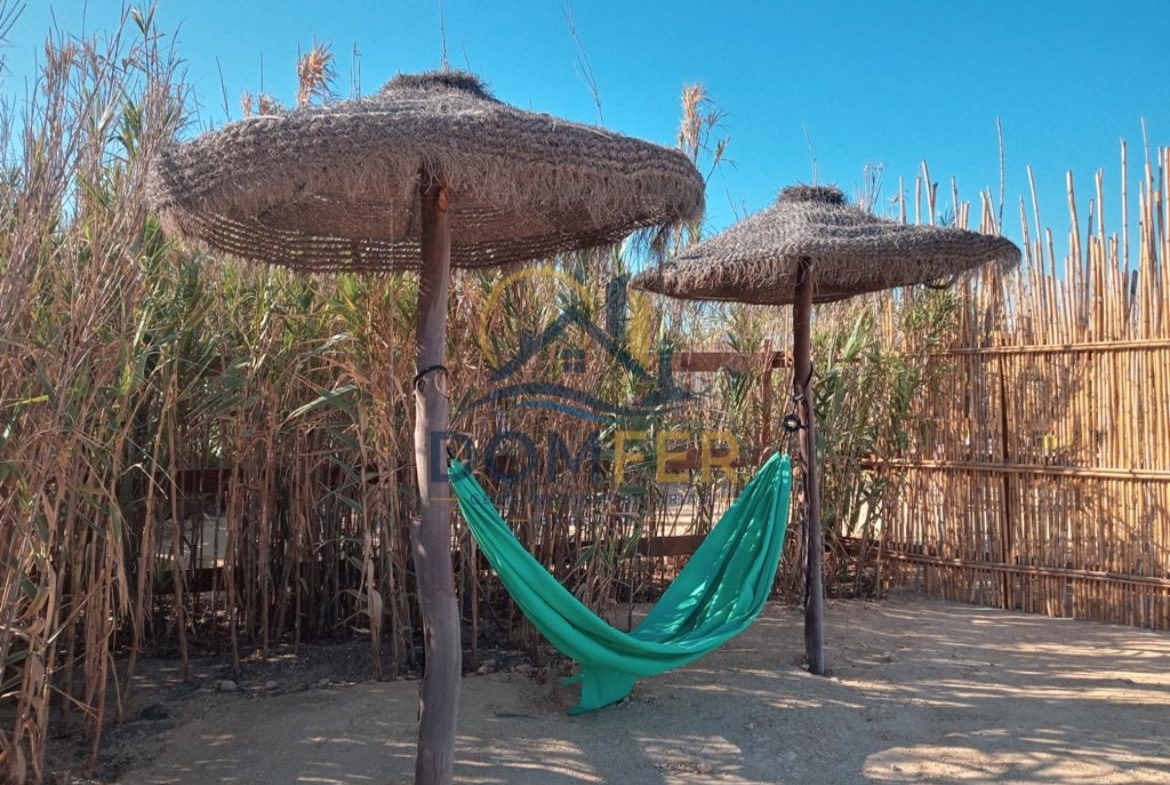 Una joya natural en la Costa de la Luz: Parcela única con vistas al mar y las marismas