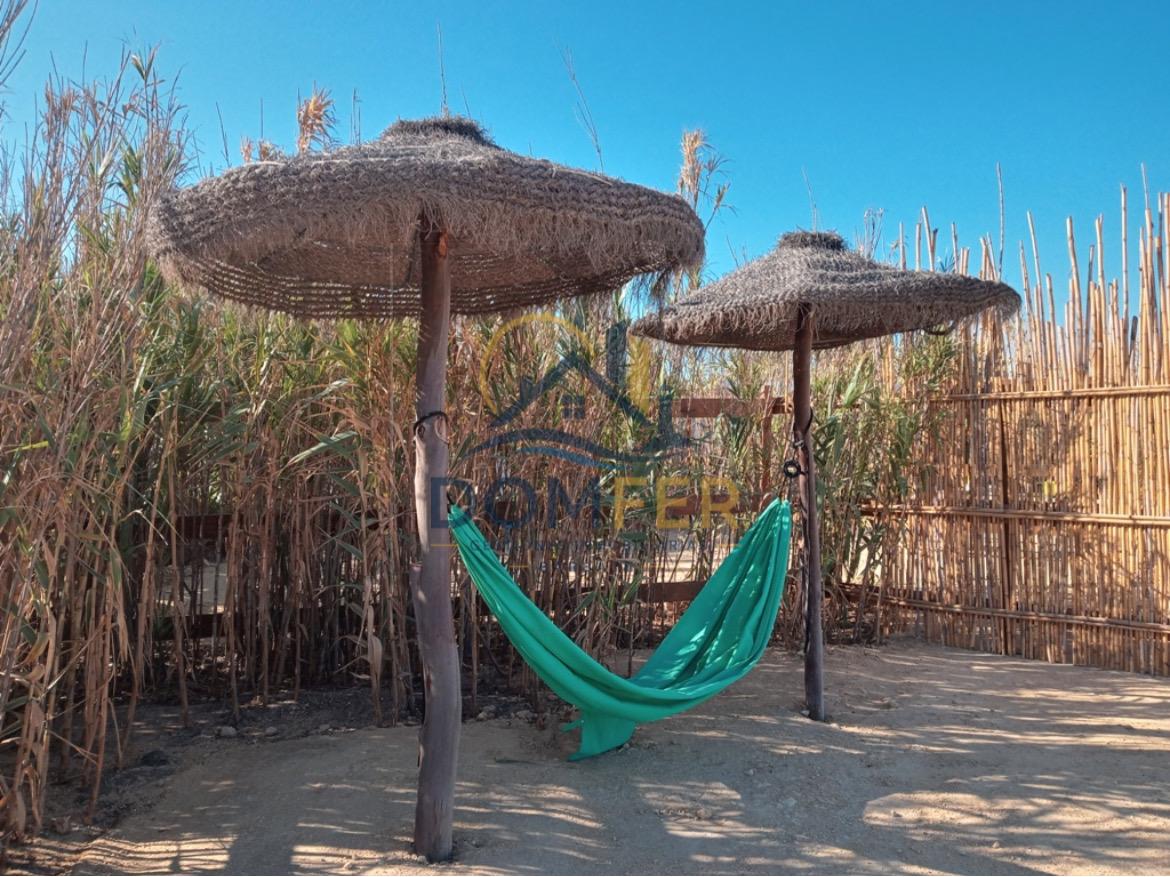 Una joya natural en la Costa de la Luz: Parcela única con vistas al mar y las marismas